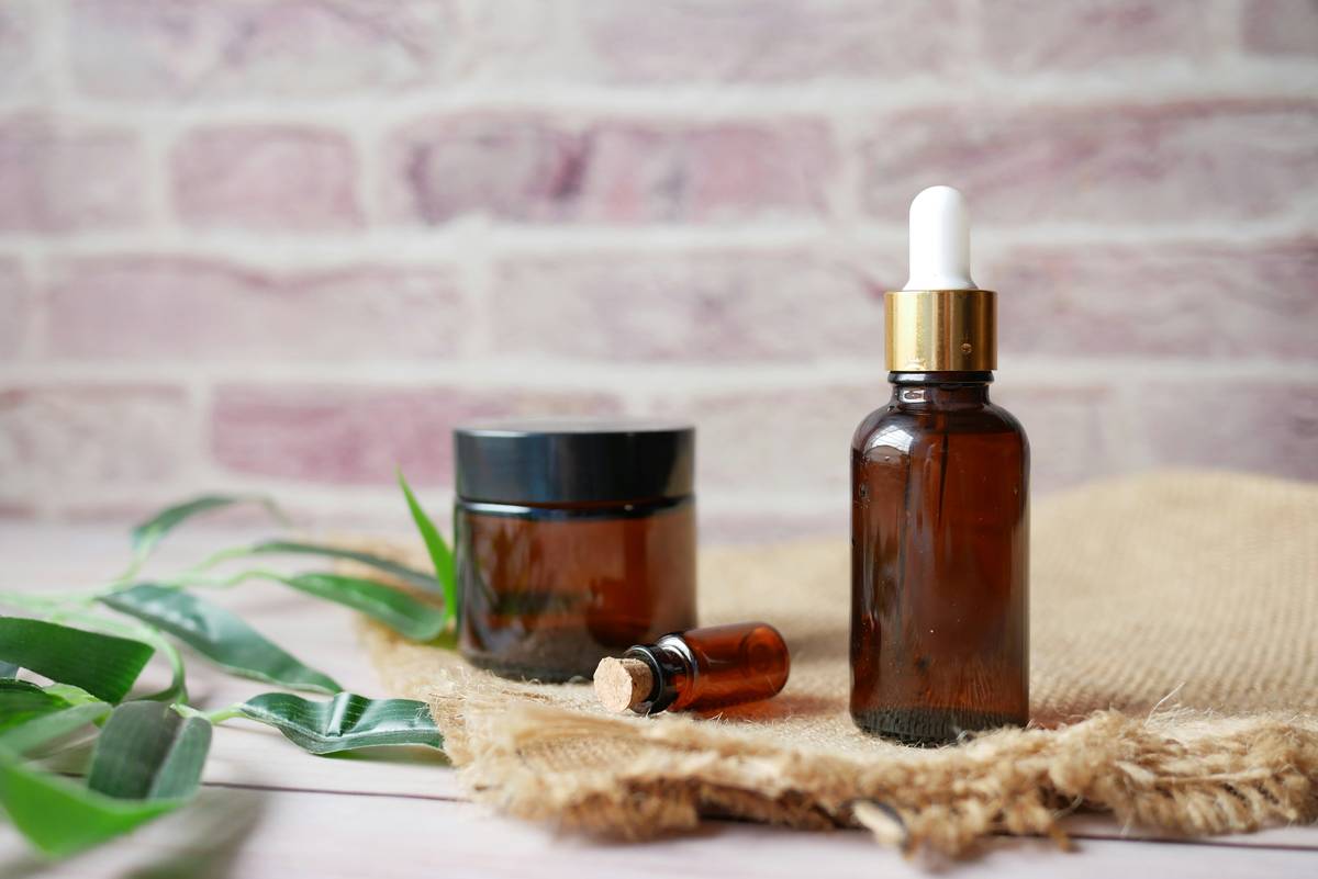 green beauty influencers showcasing organic plant-based skincare routines in a sustainable studio setting